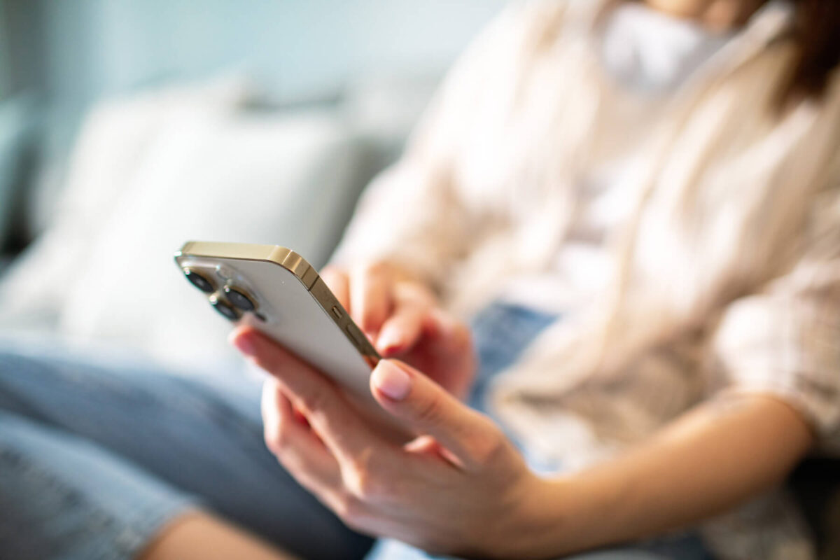 Person using their mobile phone to contact Keys Plan Management