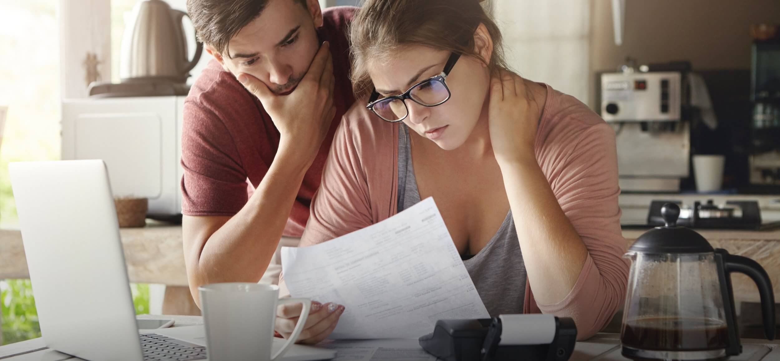 Couple reviewing their NDIS plan paperwork together